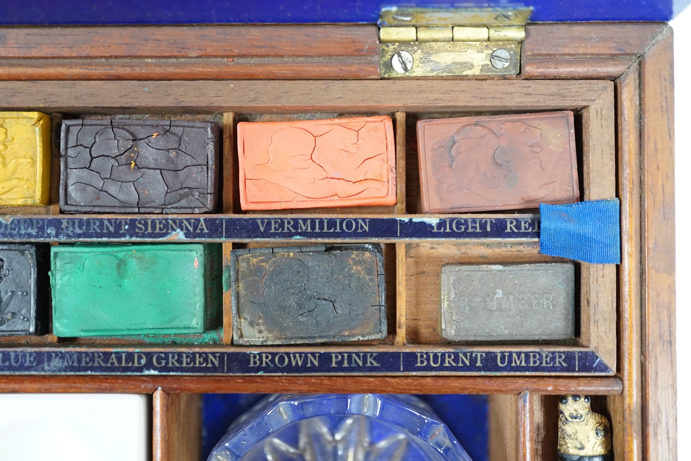 A Victorian Winsor and Newton artist's box with watercolour blocks, palettes etc. with key. Condition - fair